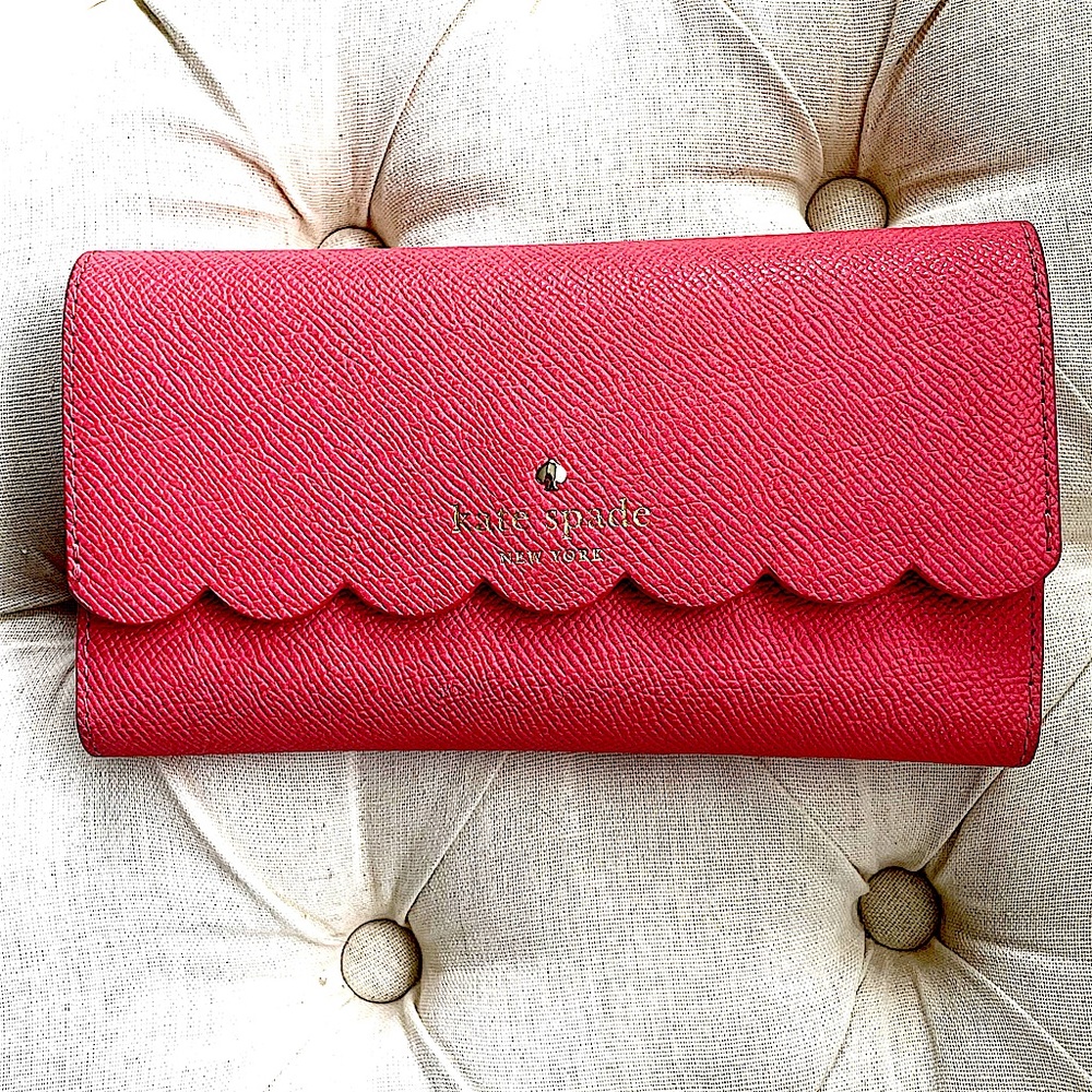 Kate Spade scalloped N183 phone wallet.